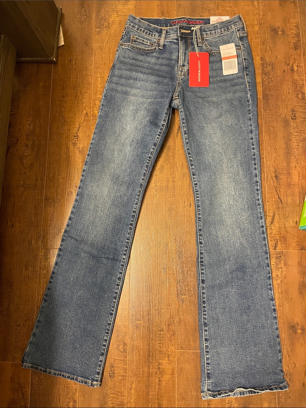 Women’s lucky brand mid rise boot cut Jeans